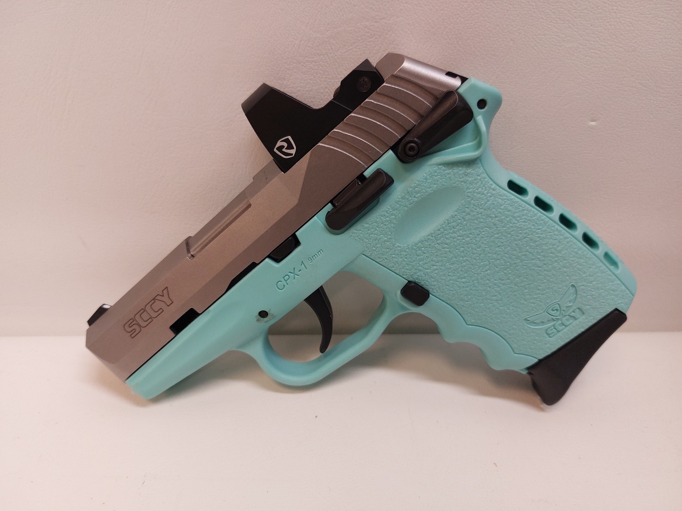 SCCY CPX1 9MM TIFFANY BLUE SS REDDOT Semi Auto Pistols at GunBroker