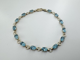  Ladies Blue Topaz 10k Yellow Gold 7" Tennis Bracelet 5.4 Grams