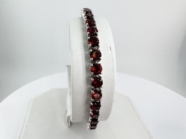  Ladies Sterling Silver Garnet 7" Tennis Bracelet