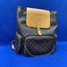 Pre-Owned Louis Vuitton Monogram Trio Backpack 