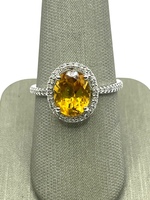  10K White Gold, Diamond Halo & Orange Oval Stone Ring