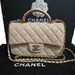 Chanel Quilted Lambskin Mini Flap Top Handle Bag