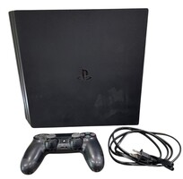 Sony PS4 with power cable and one controller