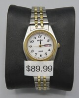 SEIKO  WOMANS TWO TONED  WATCH MODEL NUMBER V138-0AA0