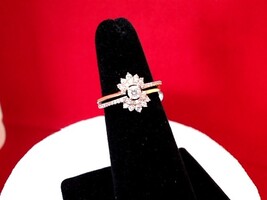 Rose Gold  With Approx .15 Center Stone 