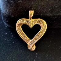  10k yellow gold heart pendant with diamonds