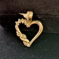  10k white gold heart pendant with diamonds
