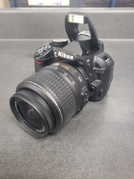 Canon D3100 with 18-55 Lens  
