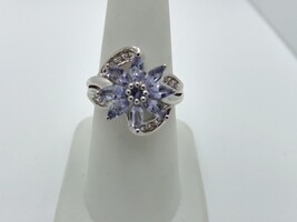  2.50DWT 10kt iolite and dia flower ring
