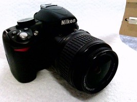 Nikon D3100 with 18-55mm lens