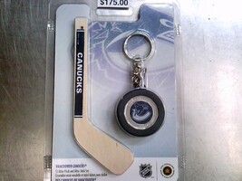 2009 Canada NHL Vancouver Canucks Dollar Mini Stick and Puck Set