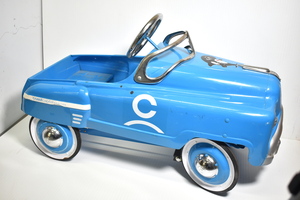 Blue Pedal Car with Coast Capital Stickers