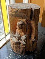Wood-Carved Bear in a Log Statue