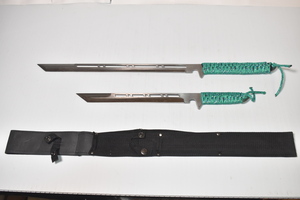 2 machete blades with blue string handles