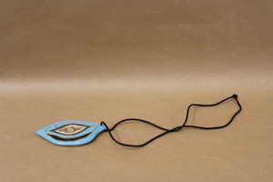 Native carving on a string. 