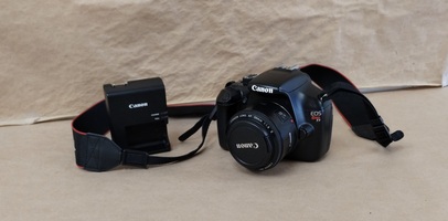 Canon Camera Kit: EOS Rebel T3, battery, charger and lens 