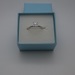 14K solitaire ring with princess cut diamond