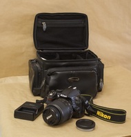 Nikon D3100 camera w/18-55mm lens/charger/in black case 