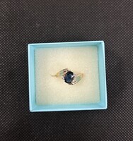 Elegant 14K Gold Ring with Dark Blue Stone