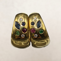  18kt yellow gold huggie earrings set with diamonds and multiple gemstones