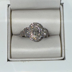  Beautiful White Gold Diamond Cluster Ring with Oval Center