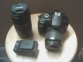 CANON REBEL T6 WITH 75-300 LENS AND 18-55 LENS PLUS BATTERY AND CHARGER
