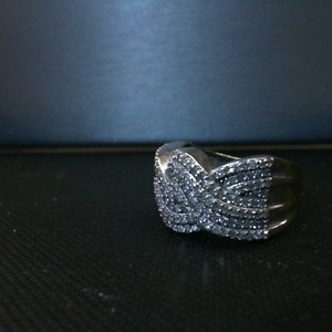  10K WHITE GOLD WITH MULTIPLE DIAMONDS APROX. .02CT EACH