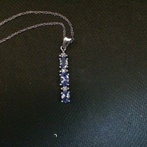  10K WHITE GOLD WITH 3 OVAL IOLITE STONES
