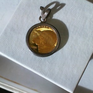  999 COIN IN PENDENT SEAL OF THE STATE OF ALASKA