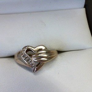 . .RING - 10K YELLOW GOLD HEART WITH 2 CLEAR STONES   