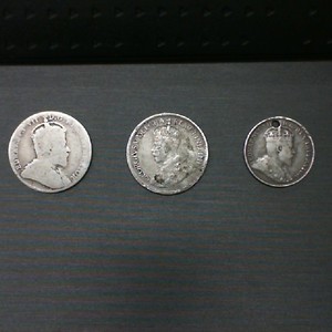 5.5 GRAMS TOTALFOR 3 COINS