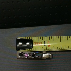  2 BLACK DIAMONDS AND 1 PINK STONE SET IN 18K WHITE GOLD PENDANT