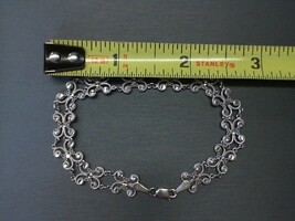  14K WHITE GOLD BRACELET FILIGREE STYLE.