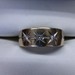  STAR SETTING WITH 3 DIAMONDS IN 14K YELLOW GOLD BAND 