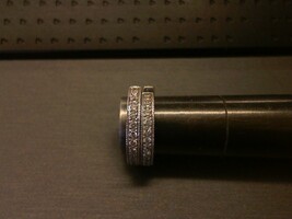  14K WHITE GOLD SMALL HOOP EARRINGS WITH MULTIPLE DIAMOND CHIPS