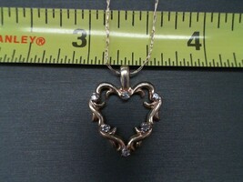  10k YELLOW GOLD CHAIN WITH HEART AND 6 DIAMONDS