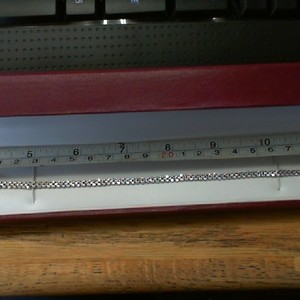 HELZBERG DIAMOND 1.5 TCW WHITE GOLD TENNIS BRACELET IN MAROON BOX
