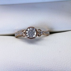  10K YELLOW GOLD RING WITH .01CT EA DIAMONDS