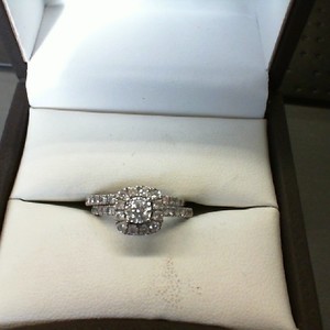  10K WHITE GOLD 2 PIECE LADIES WEDDING RING WITH .33CENTER (SI1) DIAMOND SURROUN