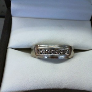  HEAVY MANS BAND WITH 7 .07CT EA DIAMONDS