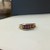  Yellow Gold 14kt Band 6.50gms with Channel Set Rectangular Gemstones 