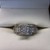. .14K WHITE GOLD DIAMOND CLUSTER RING . 1.50TCW IN DIAMONDS 
