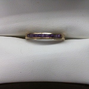  10K YELLOW GOLD BAND WITH MULTIPLE AMETHYST