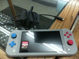 Nintendo Switch Lite - Pokemon Sword & Shield Edition w/ One Game