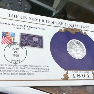 1891-O US MORGAN SILVER DOLLAR COLLECTION - WITH STAMPS - VERY NICE CONDITION