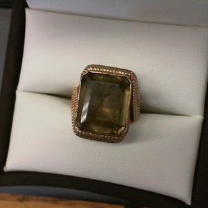 . .LARGE EMERALD CUT SMOKEY TOPAZ SET IN 18K YELLOW GOLD - 237 AL (GOLD MARK)