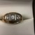  14K YELLOW GOLD BAND WITH .33CT CENTER DIAMOND WITH .25CT DIAMOND EACH SIDE -24