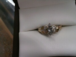  Diamond Ring with .33CT  Princess Cut Centerpiece and Baguettes on the side