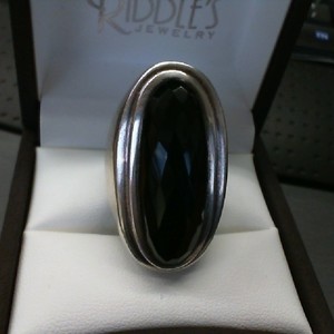  LARGE FACETED OVAL ONYX SET IN STERLING SILVER RING