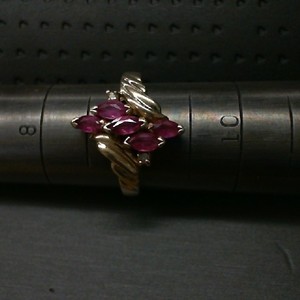  5 MARQUISE RUBYS WITH 2 DIAMOND ACCENTS SET IN 14K YELLOW GOLD BAND SIZE 9